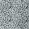 Off-White Laser-Cut Scuba Knit Neoprene - Folded | Mood Fabrics