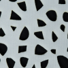 Off-White Laser-Cut Scuba Knit Neoprene - Detail | Mood Fabrics