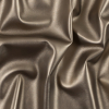 Metallic Gold Faux Leather with a Gray Faux Suede Backing | Mood Fabrics