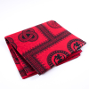 Black and Red Waxed Cotton African Print with additional Inlaid Print | Mood Fabrics