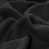 Black Solid Boiled Wool - Detail | Mood Fabrics