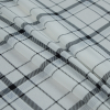 Winter White and Black Plaid Polyester Georgette - Folded | Mood Fabrics