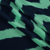 Navy and Spring Bouquet Zig Zag Ikat Printed Polyester Chiffon - Folded | Mood Fabrics