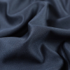 Armani Black Wool Suiting with Fused Navy Netting - Detail | Mood Fabrics