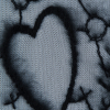 White Stretch Mesh with Black Embroidered Flocked Hearts - Detail | Mood Fabrics