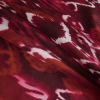 Persian Red Abstract Printed SIlk Charmeuse - Folded | Mood Fabrics