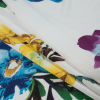 Roberto Cavalli Multi-Color Floral Print on a White Jersey - Folded | Mood Fabrics