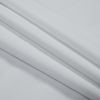 White Performance Soft Shell Woven with a Fleece Back - Folded | Mood Fabrics