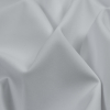 White Performance Soft Shell Woven with a Fleece Back - Detail | Mood Fabrics