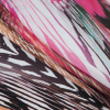 Italian Pink and Orange Abstract Jersey Knit - Folded | Mood Fabrics