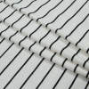Ivory and Black Pencil Striped Jersey - Folded | Mood Fabrics