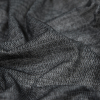 Heathered Black Warp Knitting Fusible Interfacing - Detail | Mood Fabrics