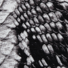 Italian Gray and Black Reptilian Jersey Print - Detail | Mood Fabrics