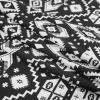 Black and White Tribal Printed Polyester Jersey - Folded | Mood Fabrics