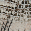 Beige and Black Reptilian Printed Jersey - Detail | Mood Fabrics