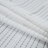 White Novelty Knit Lace - Folded | Mood Fabrics