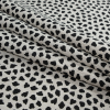 Beige and Black Cheetah Printed Linen Woven - Folded | Mood Fabrics