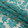 Teal Floral Embroidered on a Nude Mesh - Folded | Mood Fabrics