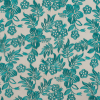 Teal Floral Embroidered on a Nude Mesh | Mood Fabrics