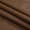 Warm Brown Faux Leather Bonded to a Cream Shearling - Folded | Mood Fabrics