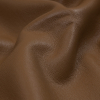 Warm Brown Faux Leather Bonded to a Cream Shearling - Detail | Mood Fabrics