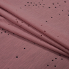 Mauve Slubbed Jersey with Lasercut Holes - Folded | Mood Fabrics