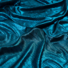 Metallic Teal Textured All-Over Foil Knit - Detail | Mood Fabrics