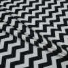 Black and White Zig Zag Printed Polyester Jersey - Folded | Mood Fabrics
