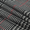 Black, White and Red Houndstooth Plaid Wool Coating - Folded | Mood Fabrics