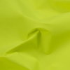 Neon Yellow Cotton-Backed Reflective Fabric - Detail | Mood Fabrics