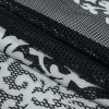 Black Wonder Mesh with White Floral Faux Leather Embroidered Borders - Folded | Mood Fabrics