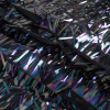 Shiny Oil Slick Fringe Sequin Fabric - Folded | Mood Fabrics