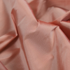 Coral Almond Plain Dyed Polyester Taffeta - Detail | Mood Fabrics
