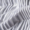White Pleated Stretch Satin - Detail | Mood Fabrics