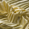 Mellow Yellow Pleated Stretch Satin - Detail | Mood Fabrics