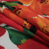 Italian Red and Orange Floral Scuba Knit - Folded | Mood Fabrics