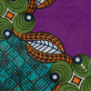 Purple, Green and Orange Waxed Cotton African Print with additional Inlaid Pattern - Detail | Mood Fabrics