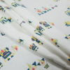 Ivory Vintage Toys 'n' Bots Cotton Jersey - Folded | Mood Fabrics