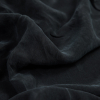 Black Cupro Plain Dyed Certified Vegan Fabric - Detail | Mood Fabrics