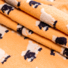 Italian Creamsicle Sheep-Filled Chunky Knit - Folded | Mood Fabrics