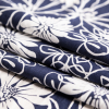 Denim and White Floral Printed Linen Woven - Folded | Mood Fabrics