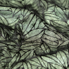 Black Stretch Velour with Metallic Green Floral Foil - Detail | Mood Fabrics