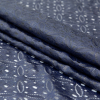 Navy Medallions Knit Lace with Clear Laminated Surface - Folded | Mood Fabrics