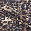 Italian Brown and Black Leopard Printed Rayon Jersey - Folded | Mood Fabrics