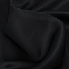 Black Sleek Scuba Knit with Filler - Detail | Mood Fabrics