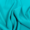 Premium Suzie Turquoise Polyester 4-Ply Crepe | Mood Fabrics
