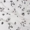 Mood Exclusive White Pictogram Pleasure Drapey Viscose Woven | Mood Fabrics