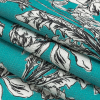 Mood Exclusive Turquoise Dandelion Drift Stretch Cotton Woven - Folded | Mood Fabrics