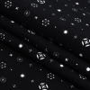 Mood Exclusive Black Celestial Shapes Stretch Cotton Poplin - Folded | Mood Fabrics