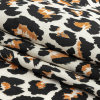 Mood Exclusive Ivory and Caramel Predator's Pride Cotton Poplin - Folded | Mood Fabrics